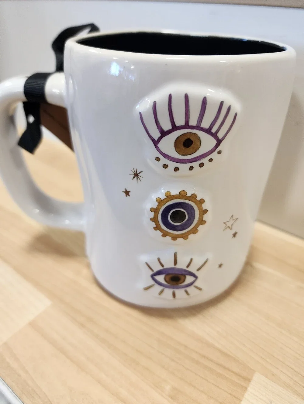 Rae Dunn White Ceramic Mug with Black Interior and Text